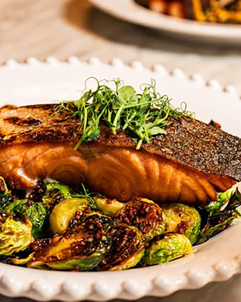 Grilled salmon with Brussels sprouts garnish