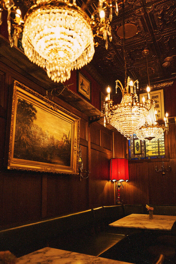 Elegant interior with chandeliers and tables